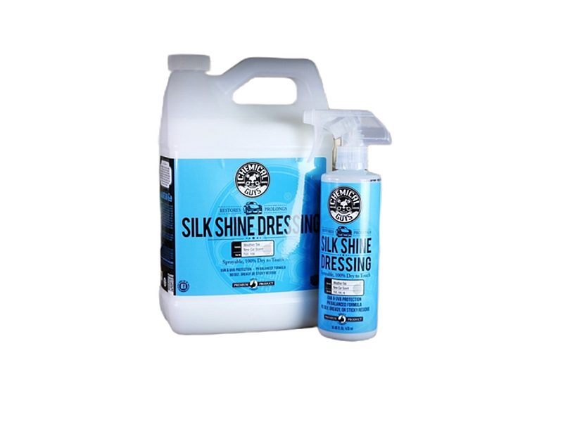 Two bottles of Chemical Guys Silk Shine vinyl, rubber, and plastic protectant in different sizes, with a larger white bottle and a smaller spray bottle both labeled with the product name.